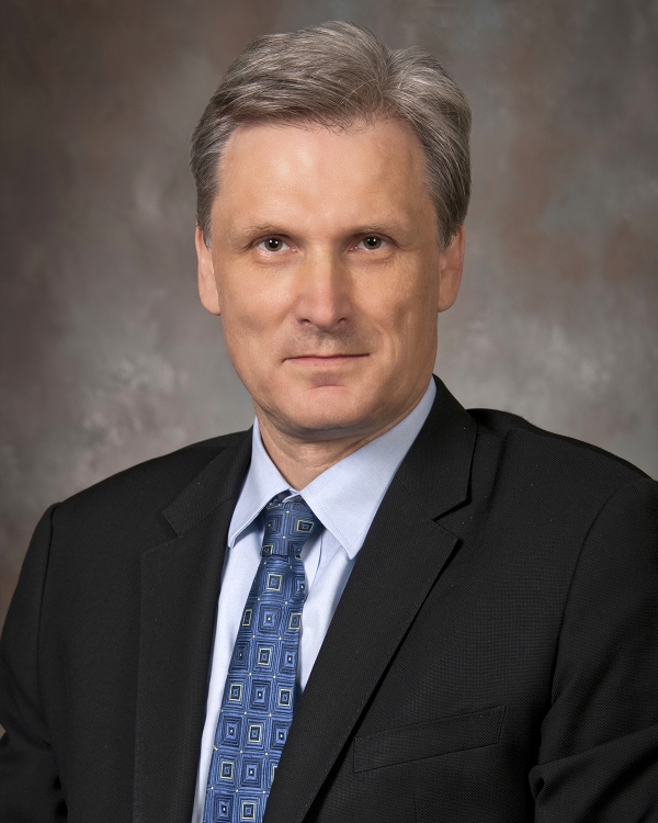 Andrew J Waters